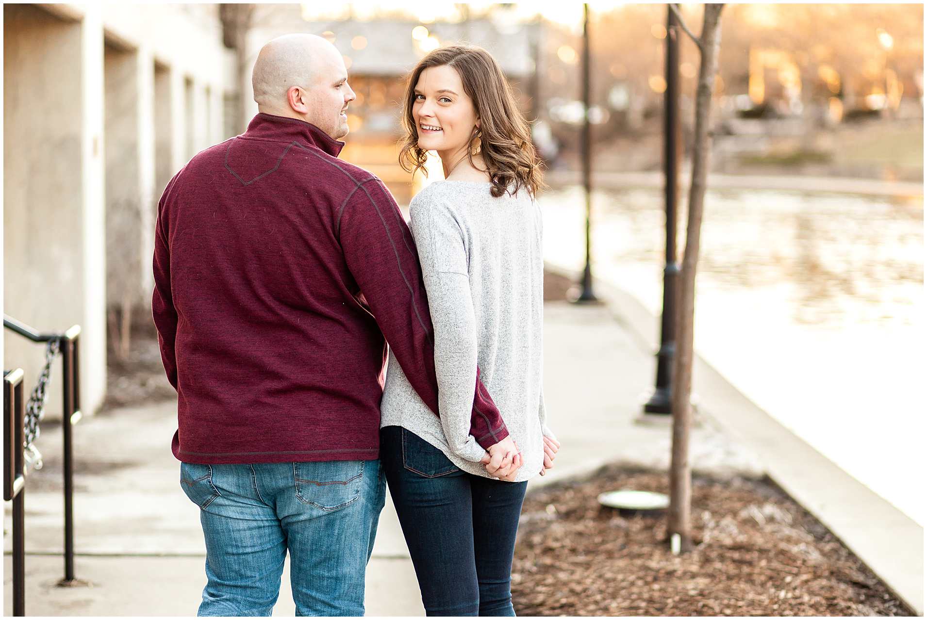 Engagement Photos by Riverwalk-Chicago Suburbs Engagement-Walking and Laughing-Downtown Naperville Engaged